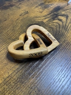 Olive wood connected hearts with custom engraved names and year